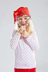 Image showing Happy young girl holding Christmas star decoration