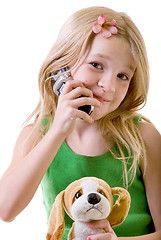 Image showing eight year old on her cell