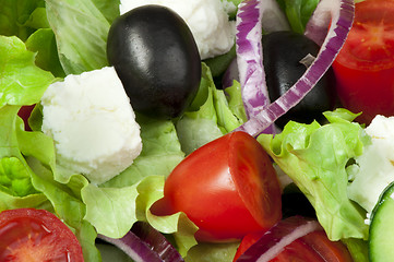 Image showing Salad in a glass bowl close up. 