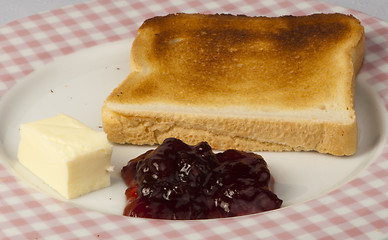 Image showing Jam, butter and toast.