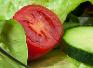 Image showing Salad in a glass bowl close up. 