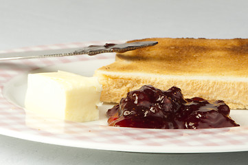 Image showing Jam, butter and toast.