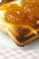 Image showing Spread jam on bread