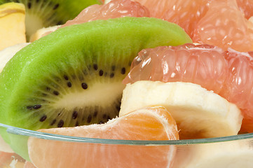 Image showing Fruit salad with citrus in a glass bowl