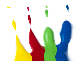 Image showing Paint coated on paper. Red, green, blue and yellow colors.