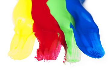 Image showing Paint coated on paper. Red, green, blue and yellow colors.