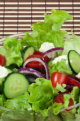 Image showing Salad in a glass bowl close up. 