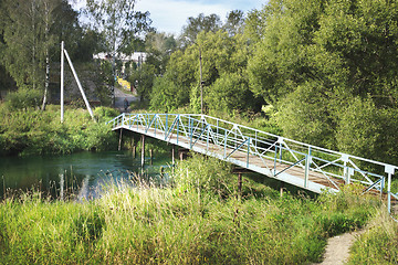 Image showing A pedestrian bridge across the river