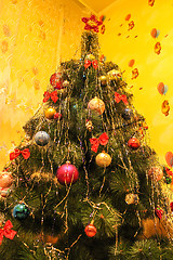 Image showing The harmonous and dressed up New Year's fur-tree