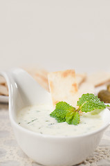 Image showing Greek Tzatziki yogurt dip and pita bread