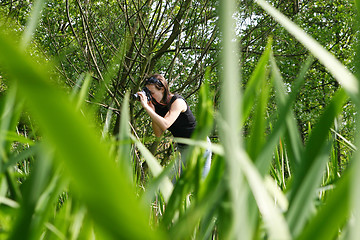 Image showing Naturalist woman photographer