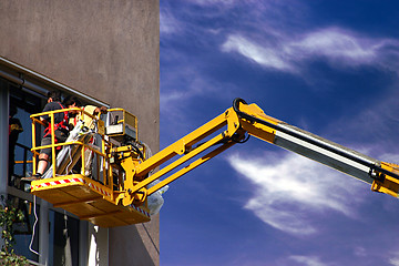 Image showing Worker on a high lift