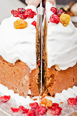 Image showing Cutting christmas cake