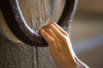 Image showing Woman knocking on a clapper