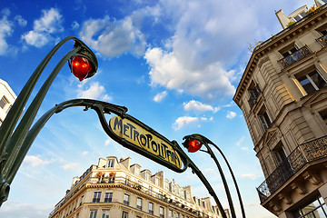 Image showing Paris. Underground Metro sign with buildings and sunset colors