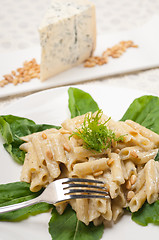 Image showing Italian pasta penne gorgonzola and pine nuts