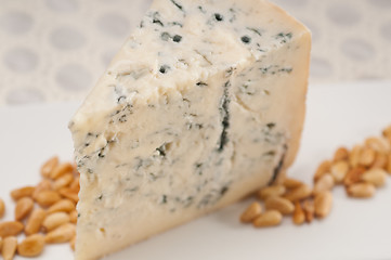 Image showing gorgonzola cheese fresh cut and pinenuts