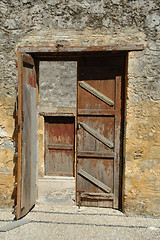 Image showing Open and closed doors