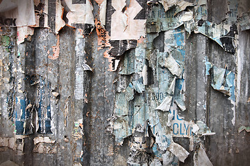 Image showing Torn posters wall