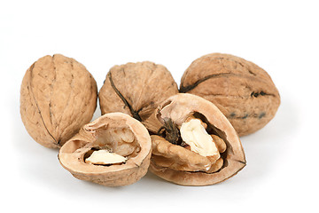 Image showing walnut and a cracked walnut isolated on white background