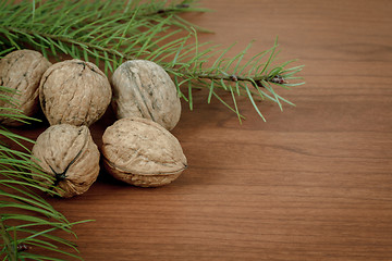 Image showing walnuts on wooden background