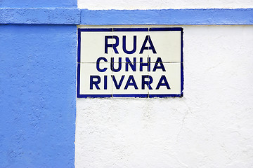 Image showing Portuguese tile plaque on blue street