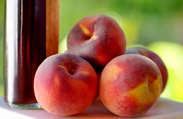 Image showing Ripe peaches and liquor