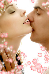 Image showing gentle kiss with flowers