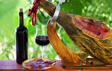 Image showing Jamon of spain and red wine.