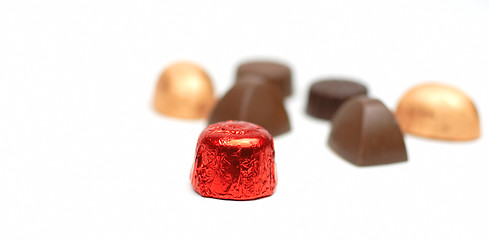 Image showing Fancy chocolates over white background