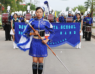 Image showing Thai students in a marching band participate in a parade, Phuket