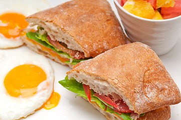 Image showing ciabatta panini sandwich eggs tomato lettuce