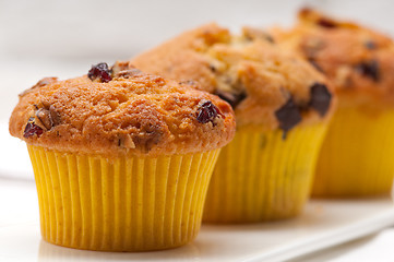 Image showing fresh chocolate and raisins muffins