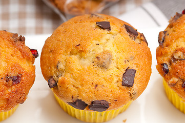 Image showing fresh chocolate and raisins muffins