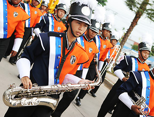 Image showing Thai students in a marching band participate in a parade, Phuket