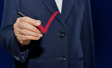 Image showing business man checking on checklist.