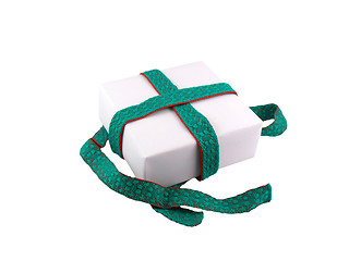 Image showing White gift box with a green bow on white background