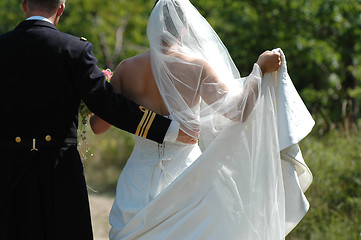 Image showing Holding the dress