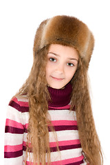 Image showing The girl in a winter fur-cap