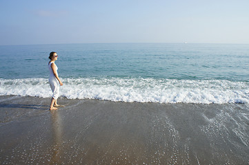 Image showing Young woman on the beach