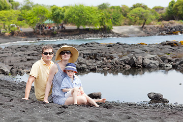 Image showing family at the black sand beach