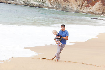 Image showing father and son at the beach