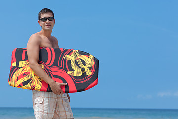 Image showing young man with boogie board