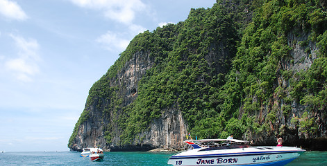 Image showing PHI PHI ISLAND, THAILAND - AUG 5: Tourists enjoy the wonderful b