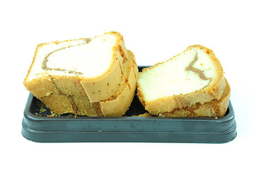 Image showing some slices of sponge cake with chocolate chips