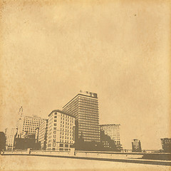 Image showing grunge image of cityscape from old paper 