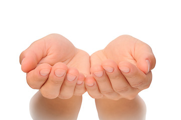 Image showing Beautiful cupped hands of young woman - isolated on white background