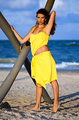 Image showing Beautiful young woman in a yellow dress