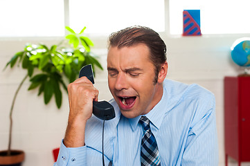 Image showing Businessman yelling during the phone call