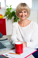 Image showing Casual blonde businesswoman in office